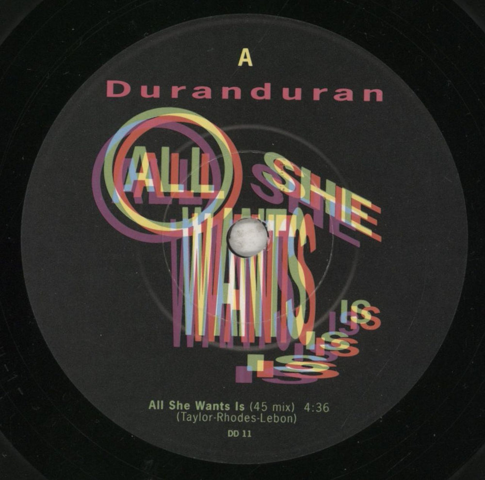 Duran Duran All She Wants Is - Poster Sleeve UK 7" vinyl single (7 inch record / 45) DDN07AL30936