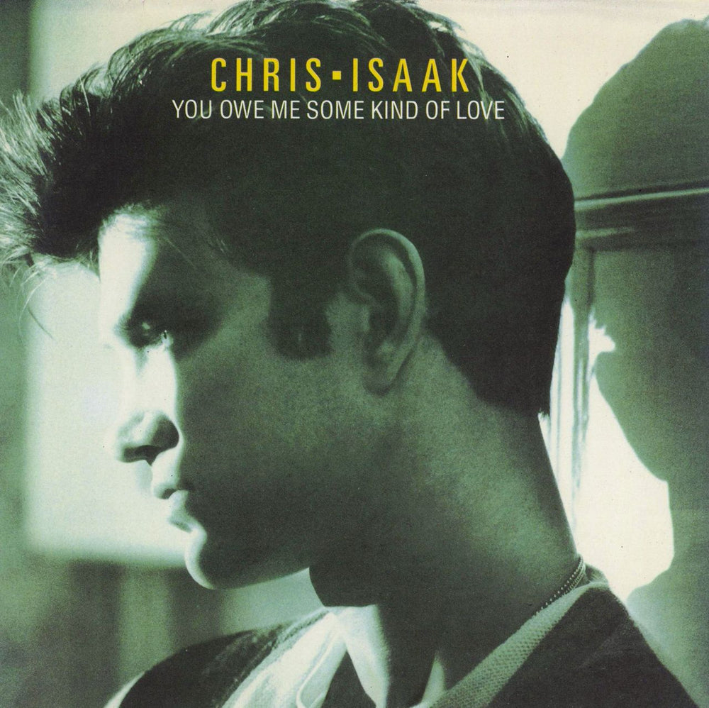 Chris Isaak You Owe Me Some Kind Of Love - Promo Stickered UK Promo 7" vinyl single (7 inch record / 45) W8467