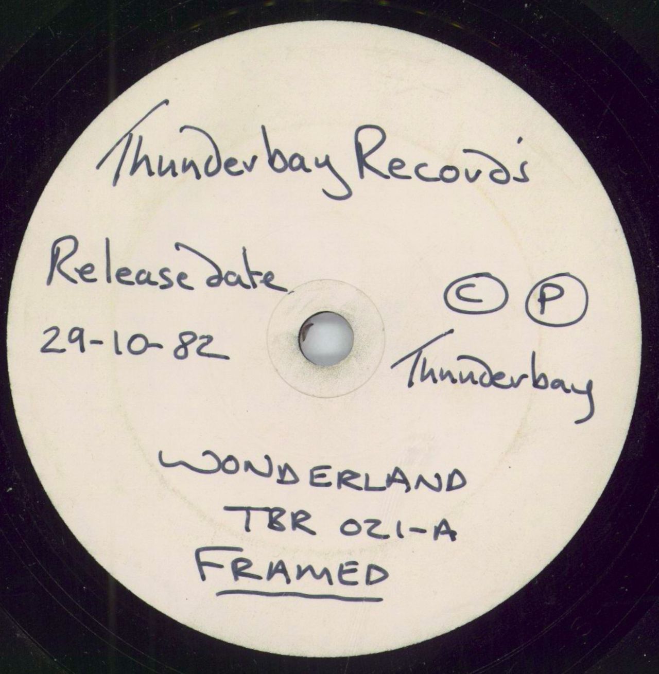 Framed Wonderland - Test Pressing UK Promo 7" vinyl single (7 inch record / 45) TBR021