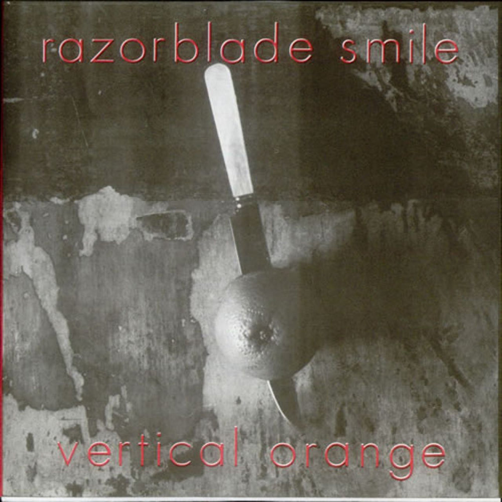 Razorblade Smile Vertical Orange UK 7" vinyl single (7 inch record / 45) CHOC002