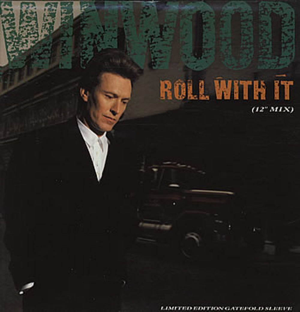 Steve Winwood Roll With It UK 12" vinyl single (12 inch record / Maxi-single) VSTG1085